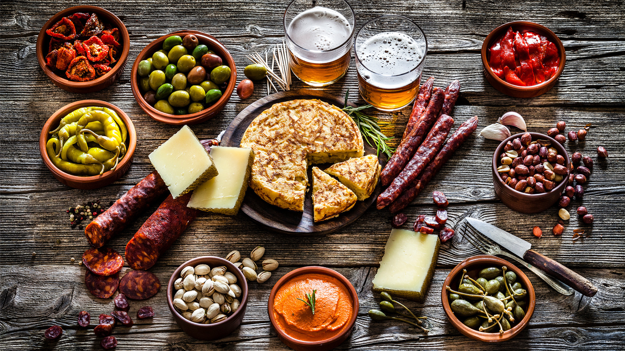 tapas-and-beer-typical-spanish-food-shot-on-rustic