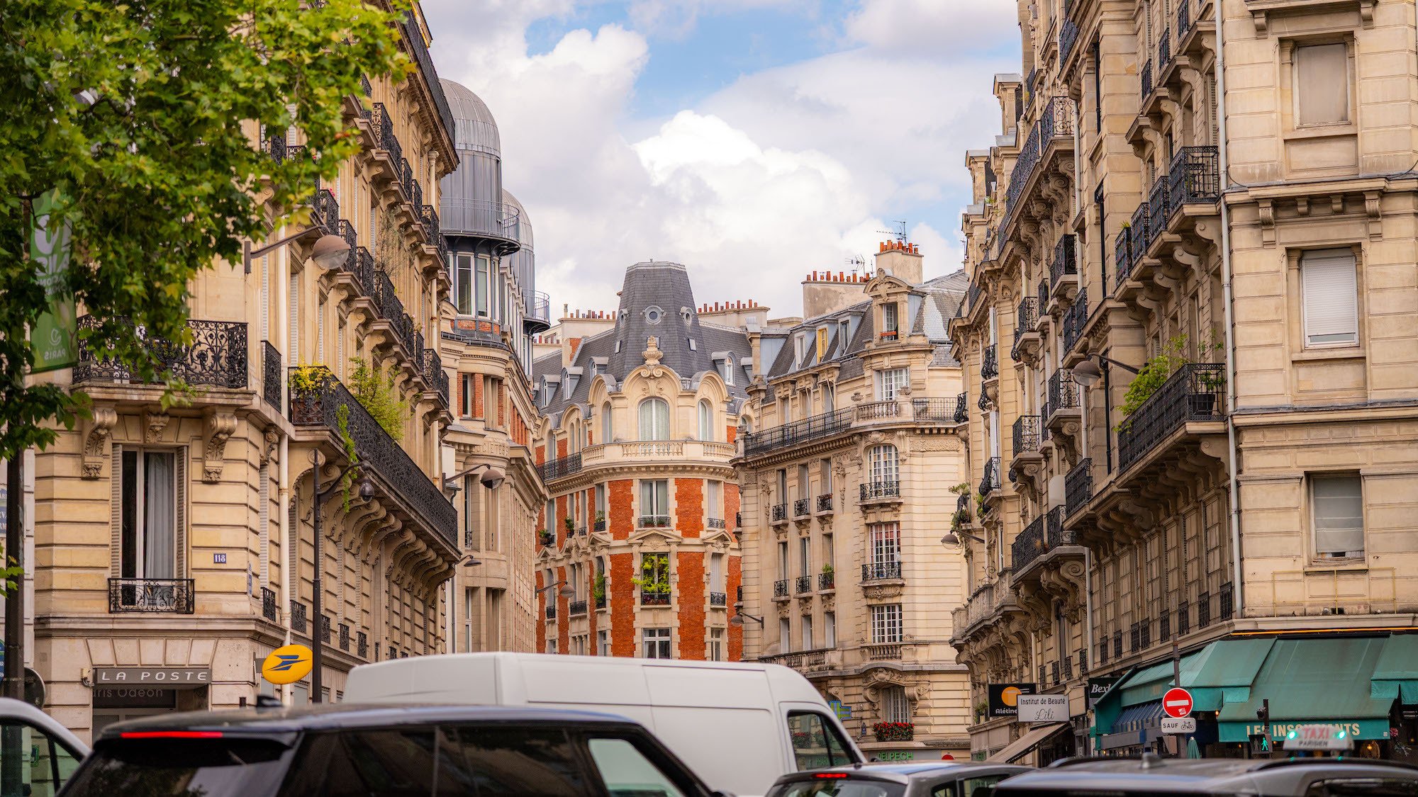immeuble-paris-rue-voiture-haussmannien-vente-loge