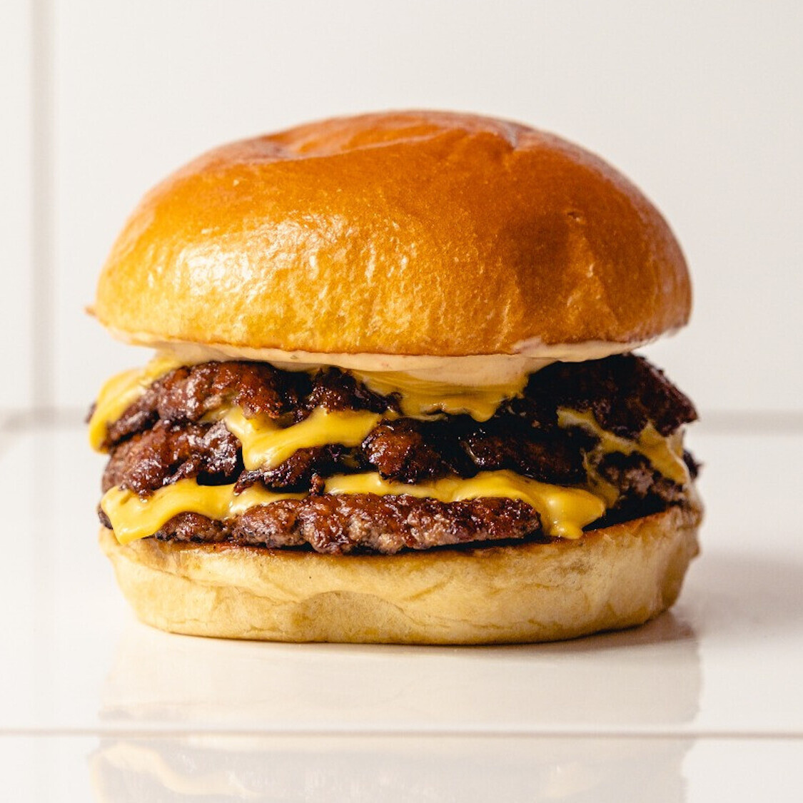 junk-smash-burger-fromage-pain-steak-cuisson-nouve