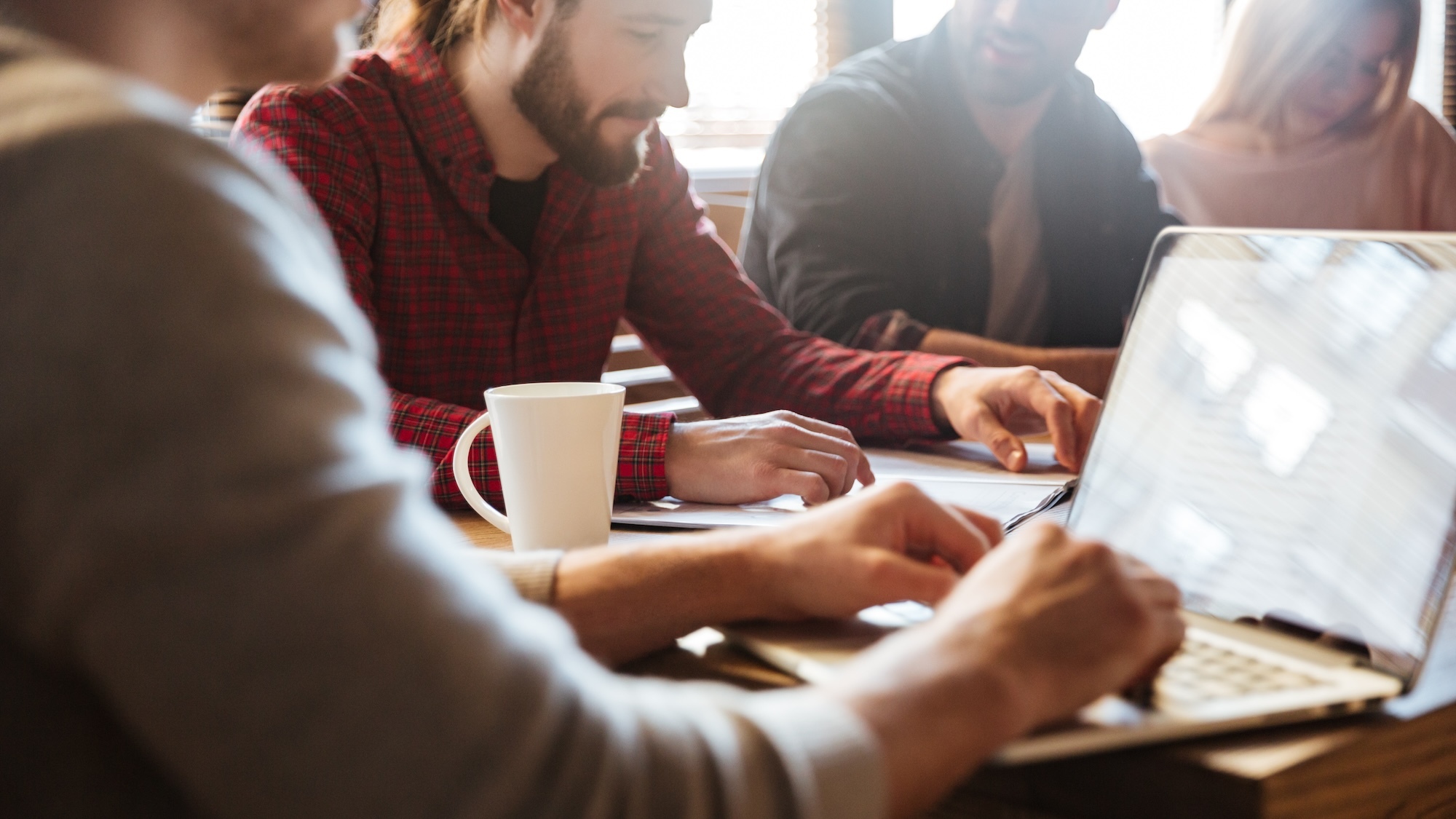 concentrated-colleagues-sitting-office-coworking