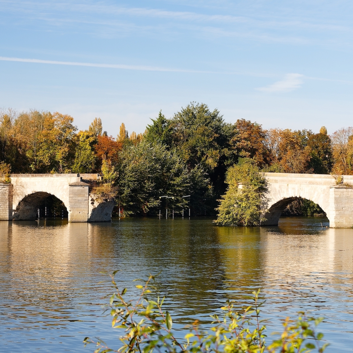 This bridge over the Seine, just an hour from Paris, is one of the oldest in France! shutterstock-2064304676