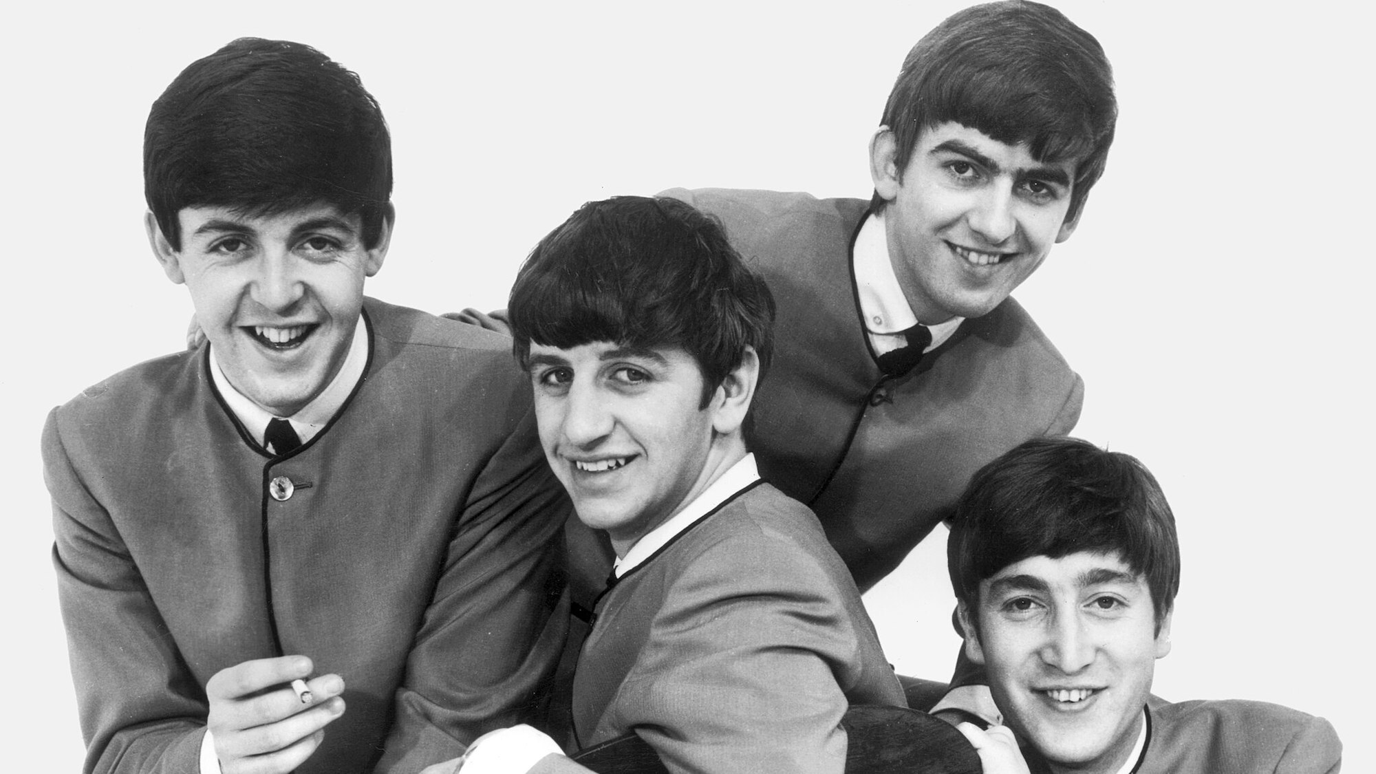 2048px-the-beatles-1963-dezo-hoffman-capitol-recor